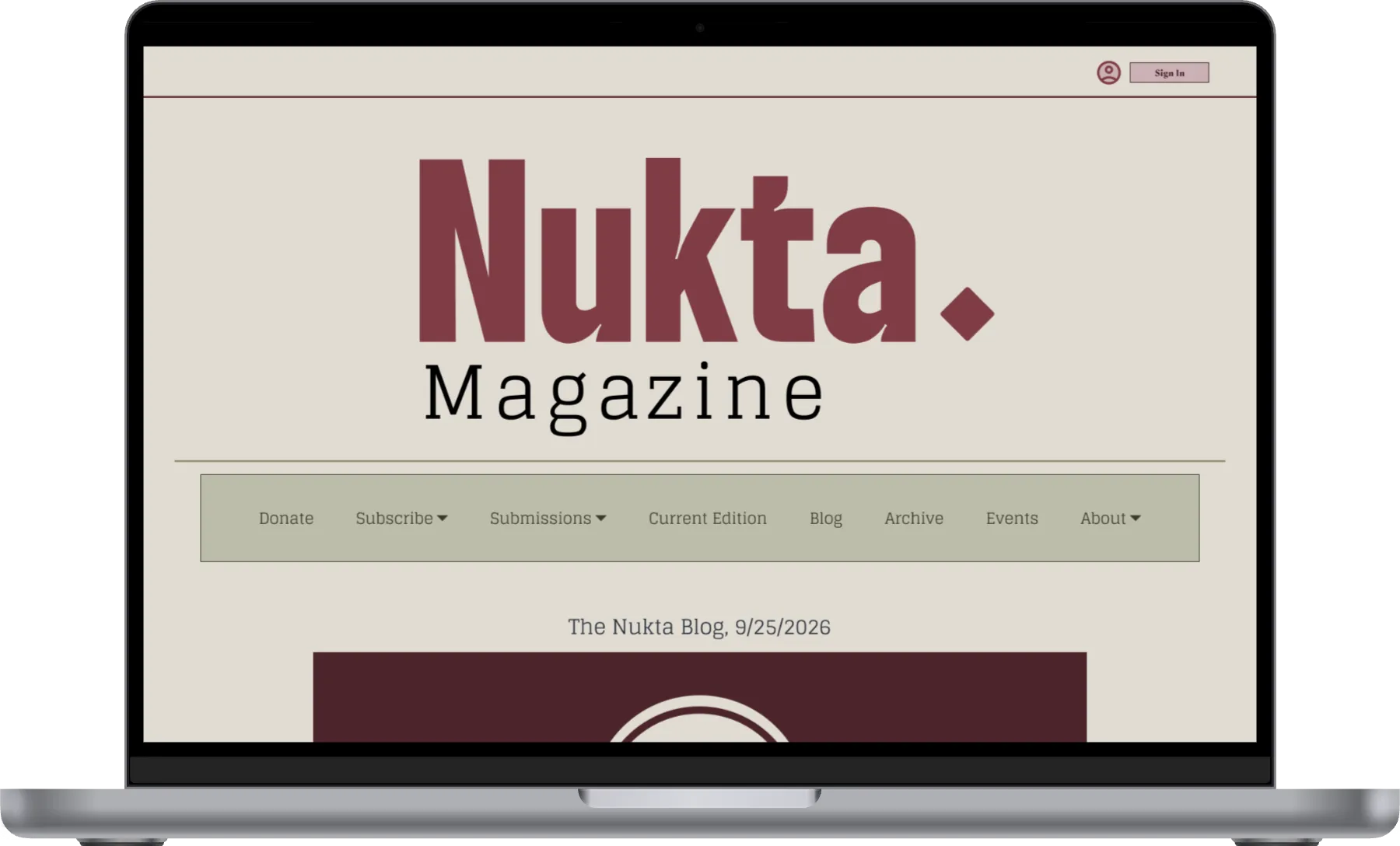 Nukta Magazine’s homepage shown on a MacBook
